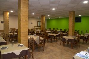 En restaurant eller et andet spisested på Complejo Hotelero La Braña