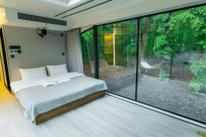 Posteľ alebo postele v izbe v ubytovaní Rado Hotel Spa