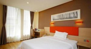 7 Days Premium Tangshan Railway Station Jiaotong University客房内的一张或多张床位