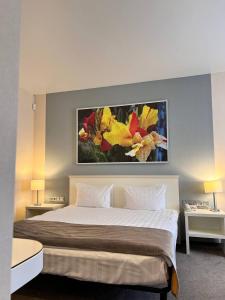 En eller flere senge i et værelse på Комплекс відпочинку "Садиба БЕРЕЗИНО"