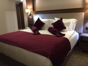 Postel nebo postele na pokoji v ubytování Paşapark Selçuklu Hotel