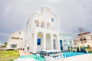 Bazén v ubytování Island Arch Homestay nebo v jeho okolí