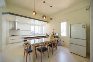 Kuchyň nebo kuchyňský kout v ubytování Island Arch Homestay
