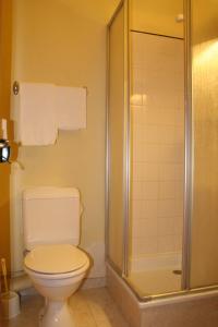 Ванна кімната в Hotel Elysée