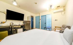 Letto o letti in una camera di Yongin Valentine
