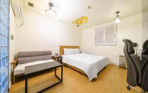 Letto o letti in una camera di Yongin Valentine