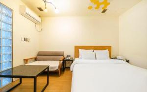 Letto o letti in una camera di Yongin Valentine