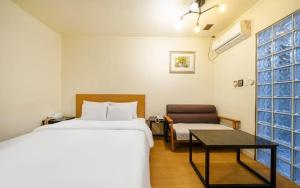 Letto o letti in una camera di Yongin Valentine