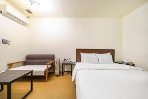 Letto o letti in una camera di Yongin Valentine