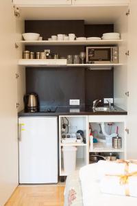 Кухня или мини-кухня в Belle Apartments - Luxury Apartments
