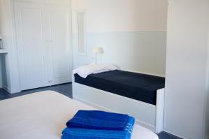 Postel nebo postele na pokoji v ubytování Residenza Punta Stendardo
