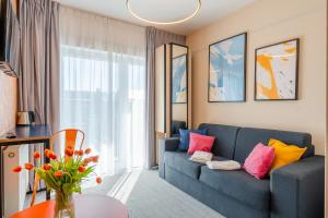 Posedenie v ubytovaní IND.U Apartamenty