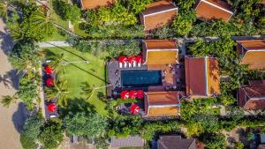 an aerial view of a resort with palm trees at Baan Thai Lanta Resort in Ko Lanta