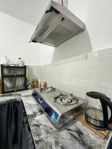 Billede fra billedgalleriet på Entire Townhouse - SANTO TOMAS BATANGAS i Santo Tomas