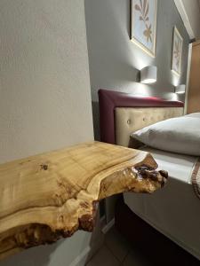 Postel nebo postele na pokoji v ubytování Semiramis