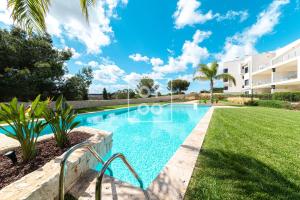 an image of a swimming pool in a villa at Classy Golf Retreat - by Oyoostays in Pilar de la Horadada