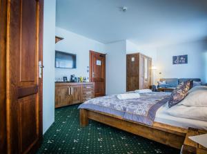 Postel nebo postele na pokoji v ubytování Hotel Friuli + 22 fotografií