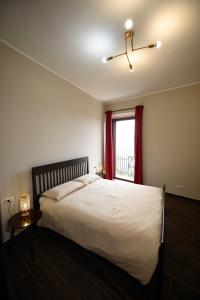 Postel nebo postele na pokoji v ubytování B&B RinasciMente
