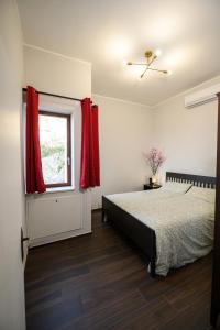 Postel nebo postele na pokoji v ubytování B&B RinasciMente