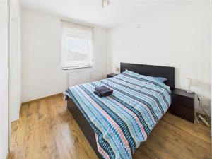 Letto o letti in una camera di Gîte charmant en Ardennes !