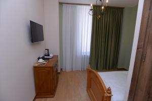 TV/Unterhaltungsangebot in der Unterkunft Old Avenue Hotel