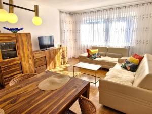 TV a/nebo společenská místnost v ubytování Gästehaus Seeblick