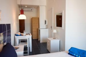 Kuchyň nebo kuchyňský kout v ubytování Residenza Punta Stendardo
