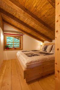 Posteľ alebo postele v izbe v ubytovaní Chalet Haberlhütte