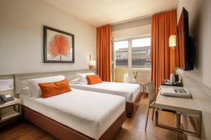 Postel nebo postele na pokoji v ubytování Grand Hotel Fleming by OMNIA hotels + 37 fotografií