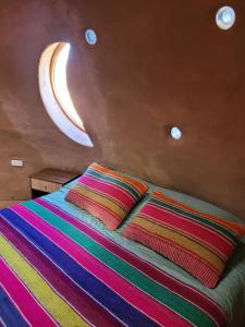 Postel nebo postele na pokoji v ubytování Cupula Sagrada + 30 fotografií