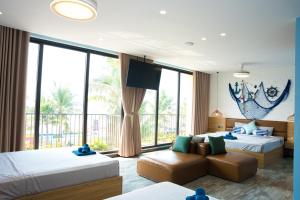 Postel nebo postele na pokoji v ubytování Lamer Homestay