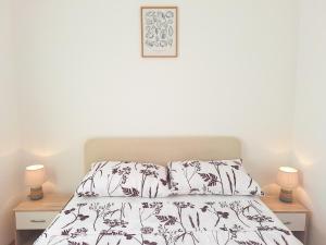 Voodi või voodid majutusasutuse Sunny Garden Čižići Krk toas