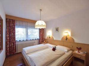 Postel nebo postele na pokoji v ubytování Residence Salvan