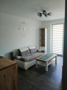 Χώρος καθιστικού στο Fajny Apartament