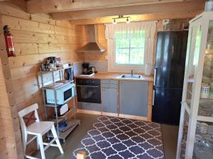 Kuchyň nebo kuchyňský kout v ubytování Fröya Timber Cottage