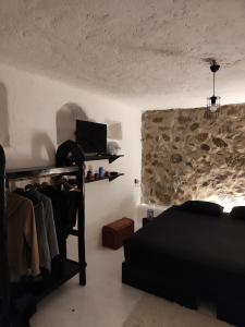 A television and/or entertainment centre at Artemis Studio Pyrgi