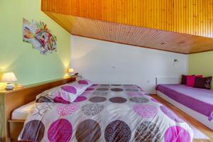 Postel nebo postele na pokoji v ubytování Apartments Petra