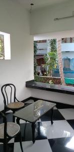 Afbeelding uit fotogalerij van 2 AC Room in KUTHUPARAMBA in Kottayam