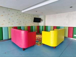 TV a/nebo společenská místnost v ubytování Ming Garden, LoveLace Suite