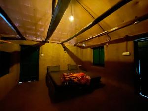 Posezení v ubytování 4Acres Farm Stay and Natural Mudhouse + 18 fotografií