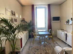 Η κουζίνα ή μικρή κουζίνα στο 54 ROSSELLI ROOMS