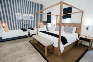 Katil atau katil-katil dalam bilik di The Palms Boutique Hotel +32 gambar