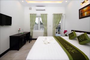 Gallery image of Flame Flowers Homestay in Hoi An