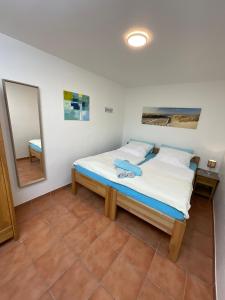 Katil atau katil-katil dalam bilik di Ferienwohnung In Dassow