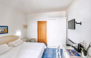 TV a/nebo společenská místnost v ubytování Hotel Cava Dell'Isola