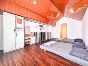 Postel nebo postele na pokoji v ubytování Homestay Abbasy Prambanan