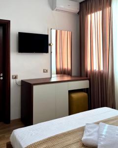 Postel nebo postele na pokoji v ubytování Triena Rooms