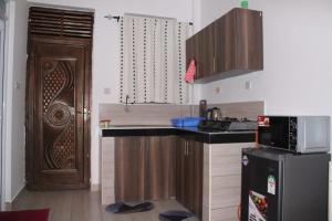 Kuchyň nebo kuchyňský kout v ubytování Koi Serenity Homes