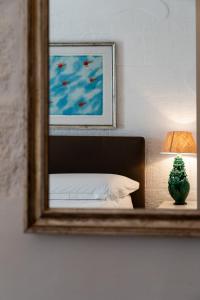 Postel nebo postele na pokoji v ubytování Santo Stefano Home & Breakfast