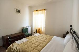 Postel nebo postele na pokoji v ubytování Gran sasso white house